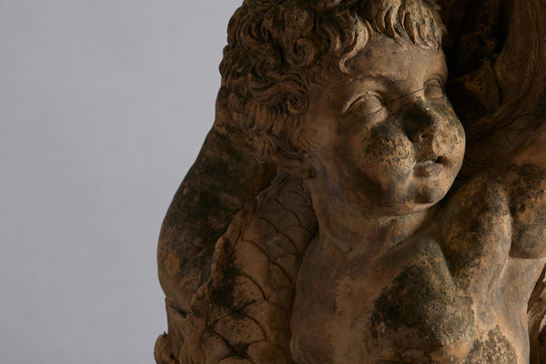 Mid to Late 18th Century Terra Cotta Fountainhead of a Putto Riding a Dolphin