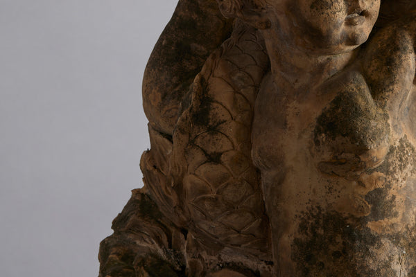 Mid to Late 18th Century Terra Cotta Fountainhead of a Putto Riding a Dolphin