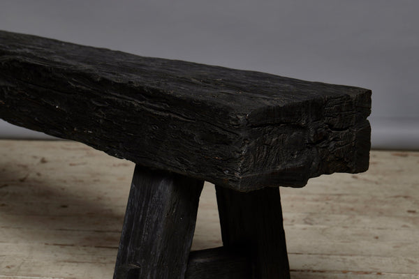 Long Chunky Top Ebonized Teak bench constructed from Bridge parts from Borneo