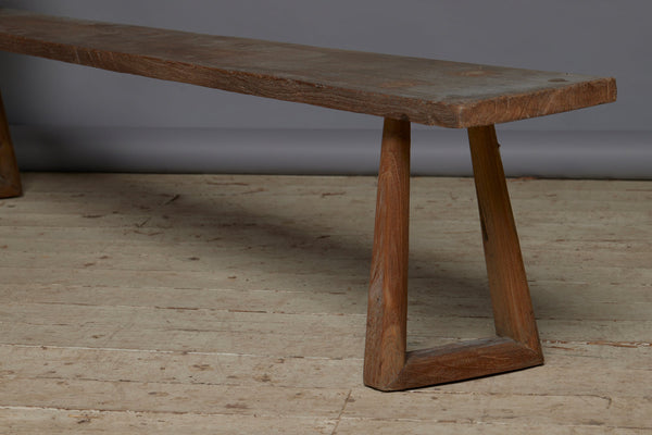 A Wide Top Splayed Leg Early Teak Bench with Beautiful Butterfly Repairs to the Top and a Round Tapered Leg