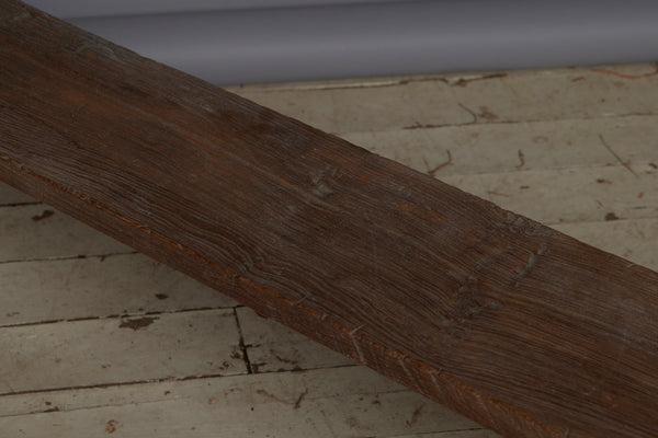 A Wide Top Splayed Leg Early Teak Bench with Beautiful Butterfly Repairs to the Top and a Round Tapered Leg