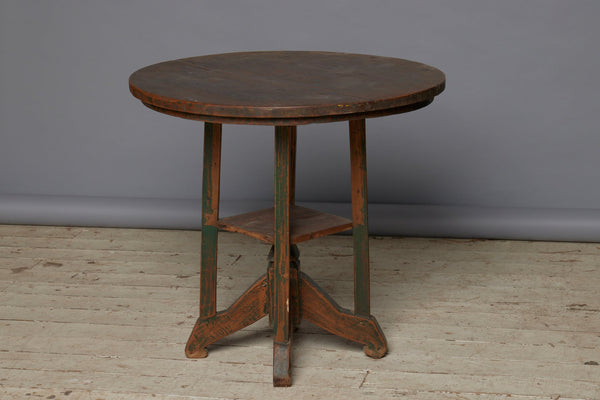 Late 19th Century Arts and Crafts Style Round Top Primitive Teak End Table with a Small Display Shelve Underneath with Traces of Old Green Paint