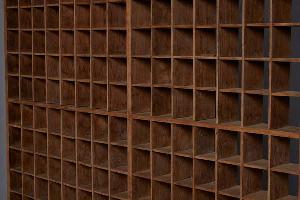 Late 19th Early 20th Century Teak Shallow Gridded Room Divider with a Delicate Skeletal Base from Jakarta