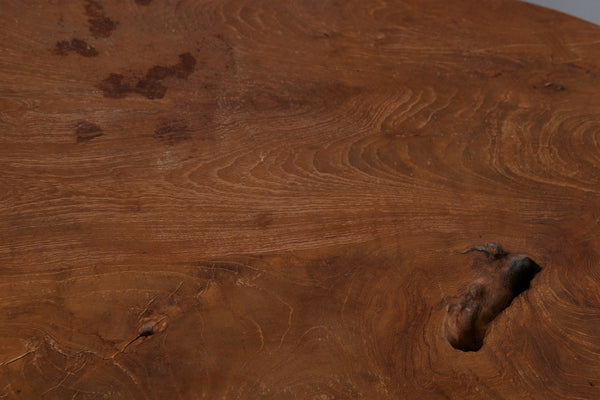 Primitive Oval Top Burled Teak Coffee Table with a Turned Stretcher Base