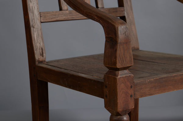 Pair of 19th Century Dutch Colonial Teak Arm Chairs with a Slightly Crested Back