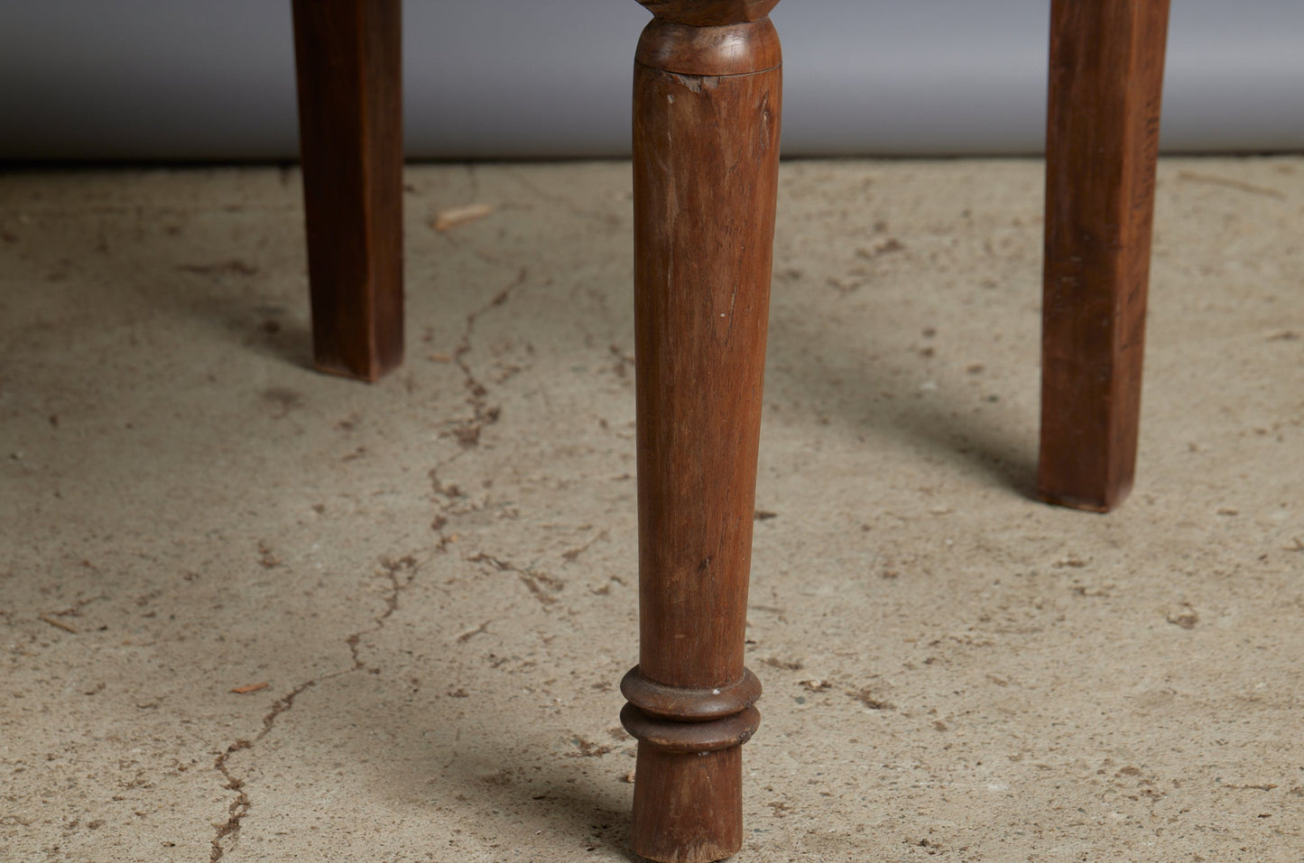 Pair of 19th Century Dutch Colonial Teak Arm Chairs with a Slightly Crested Back