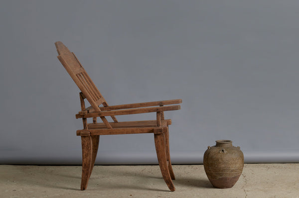 Late 19th Century Crested Back Sculptural Form Teak Lounging Chair from the Madura Island in Sumatra