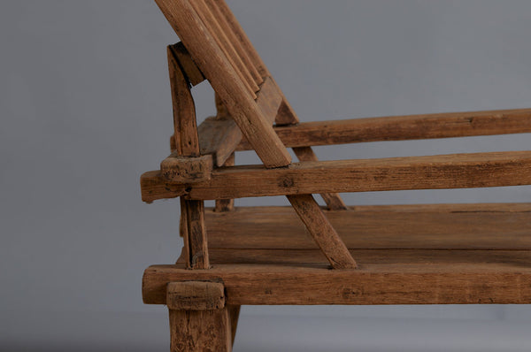 Late 19th Century Crested Back Sculptural Form Teak Lounging Chair from the Madura Island in Sumatra