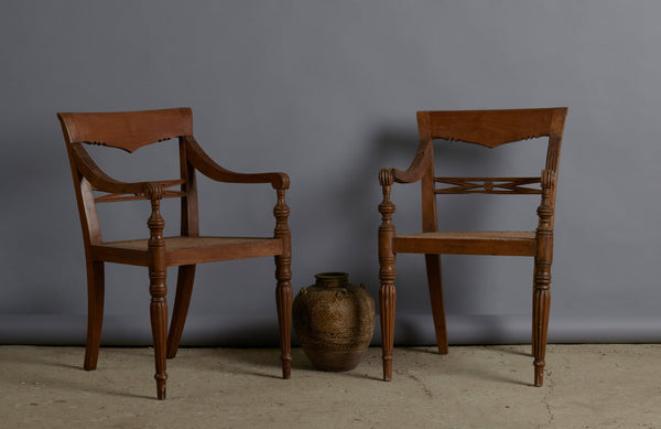 Pair of Light colored Teak Cane Seated Raffles Chairs from Java with a Delicate Gadrooned Legs
