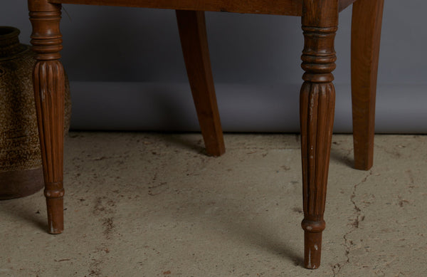 Pair of Light colored Teak Cane Seated Raffles Chairs from Java with a Delicate Gadrooned Legs