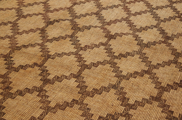 Large Early Tuareg Carpet with an Overall Interlocking Pattern with Decorative Leather Fringe (7'7" x 14'4")