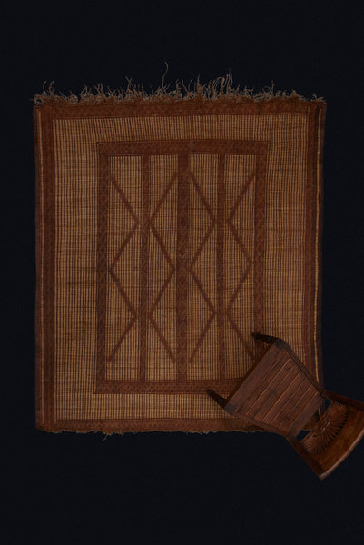 Medium Sized Early Tuareg Carpet Boasting a Central Field of Interlocking Diamonds.......... (6'2" x 7'2")
