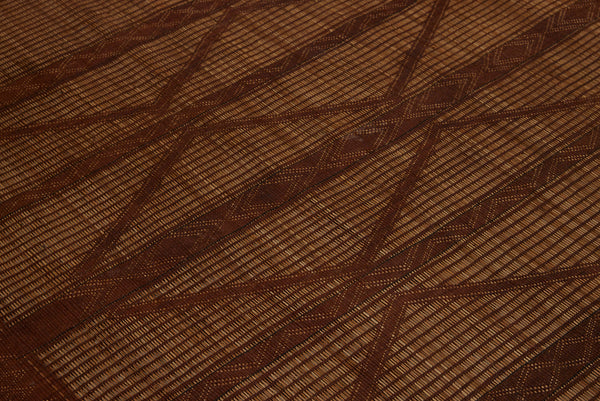 Medium Sized Early Tuareg Carpet Boasting a Central Field of Interlocking Diamonds.......... (6'2" x 7'2")