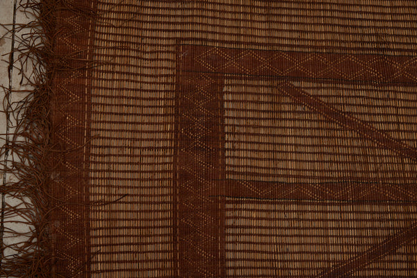 Medium Sized Early Tuareg Carpet Boasting a Central Field of Interlocking Diamonds.......... (6'2" x 7'2")