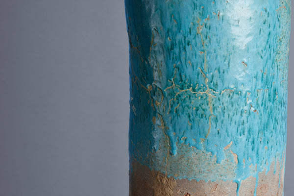 Blue Green Glaze Stoneware Amphora with a Tripod Iron Base from the Island of Borneo