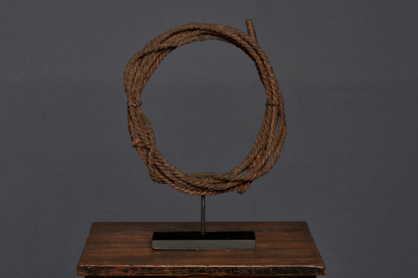 Mounted Rattan Lariat on a Stand
