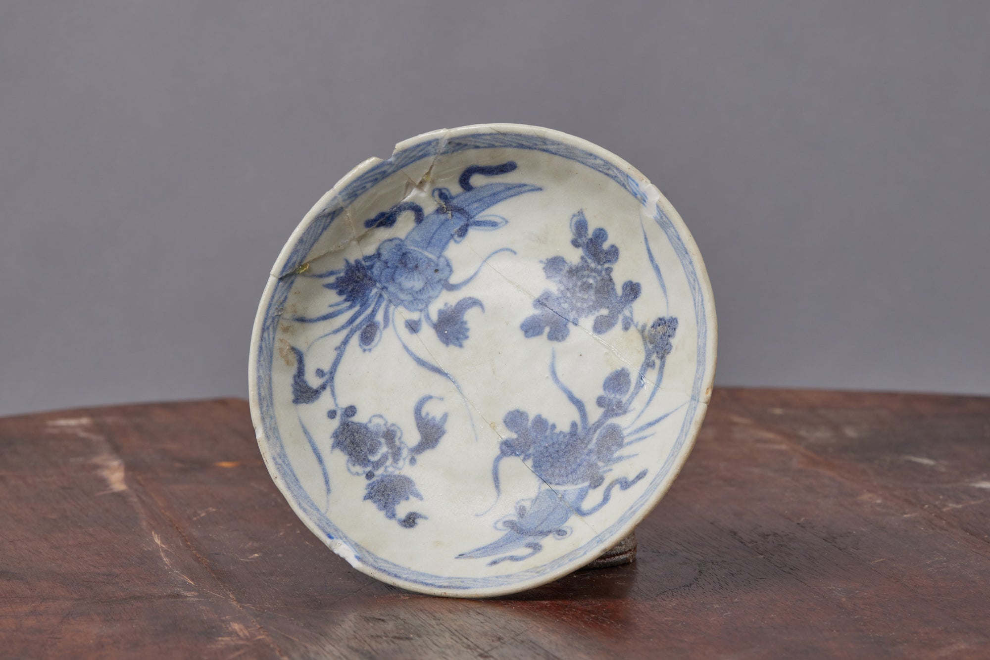 Repaired Blue & White 18th Century Tea Bowl Saucer with Cornucopia & Floral Design