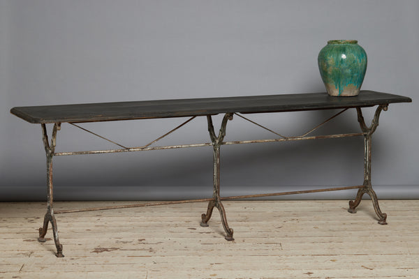 Long French Iron Based Bistro Table with a Wooden Top
