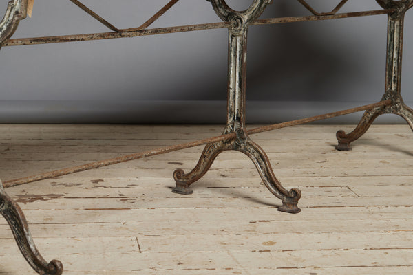 Long French Iron Based Bistro Table with a Wooden Top