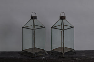 Medium Sized Tin and Beveled Glass Lantern from Bali with Shaped Metal and Glass Foot
