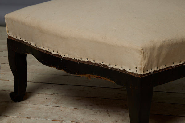 Shaped French Upholstered Ottoman with Cabriolet Legs