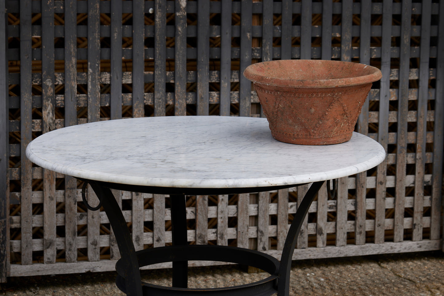 Wrought Iron Moroccan Garden with Marble Top featuring a Bec de Corbin Edge