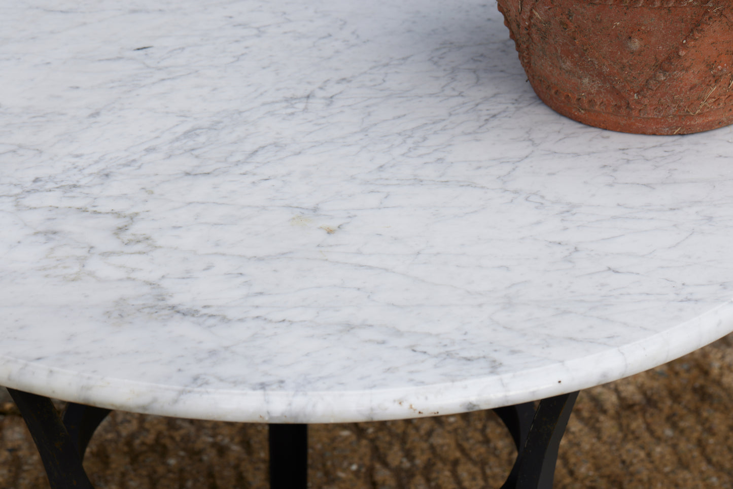 Wrought Iron Moroccan Garden with Marble Top featuring a Bec de Corbin Edge