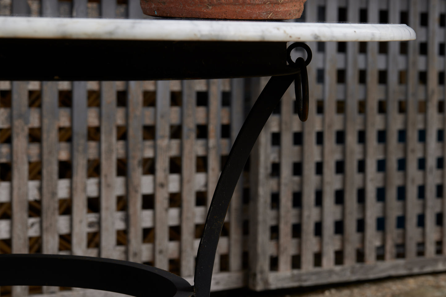 Wrought Iron Moroccan Garden with Marble Top featuring a Bec de Corbin Edge