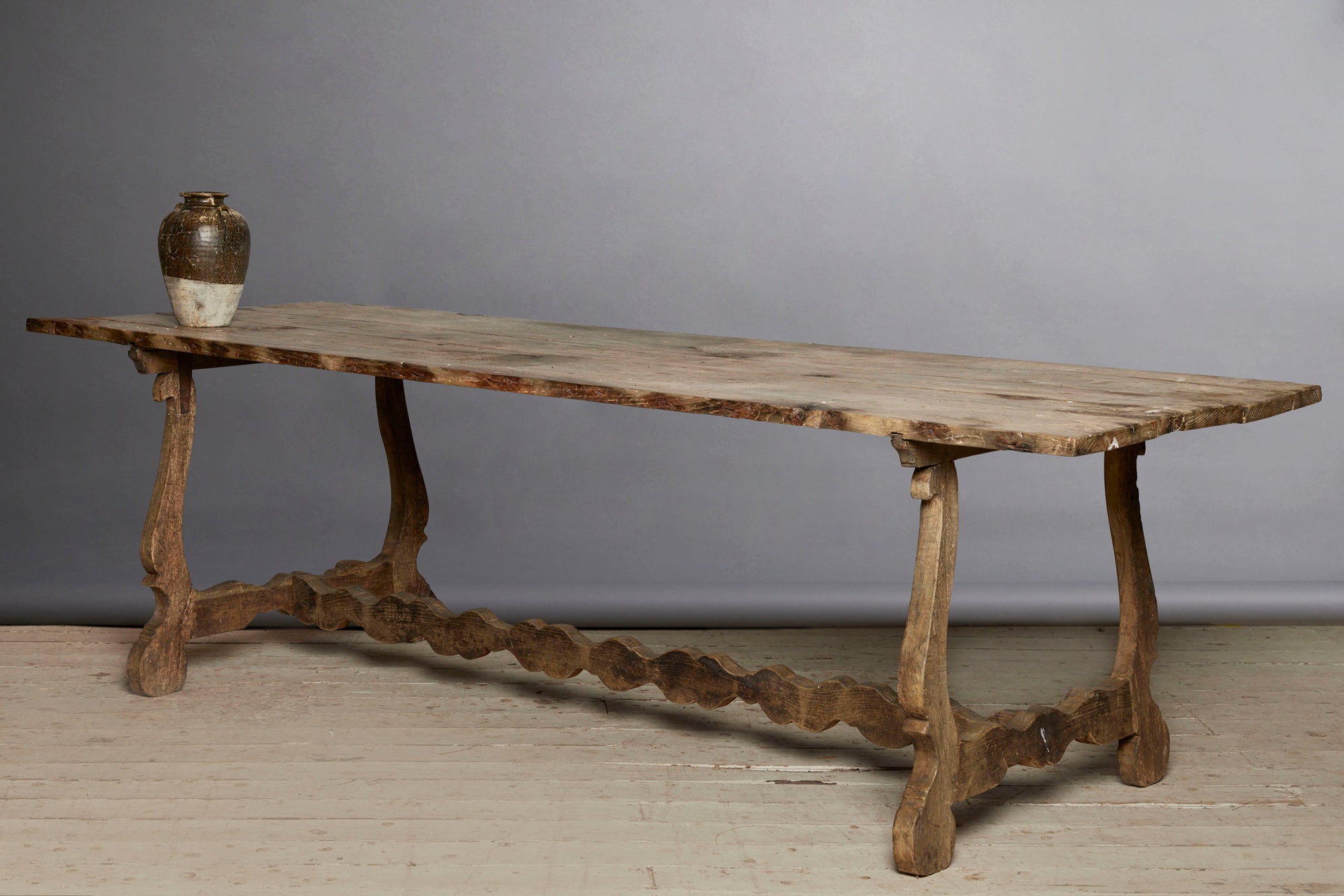 Early 19th Century Spanish Oak Table with Harp Shape Base & Scallop Form Stretcher