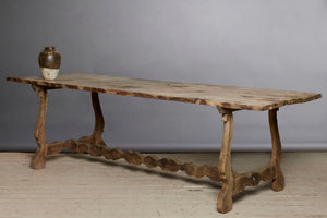 Early 19th Century Spanish Oak Table with Harp Shape Base & Scallop Form Stretcher
