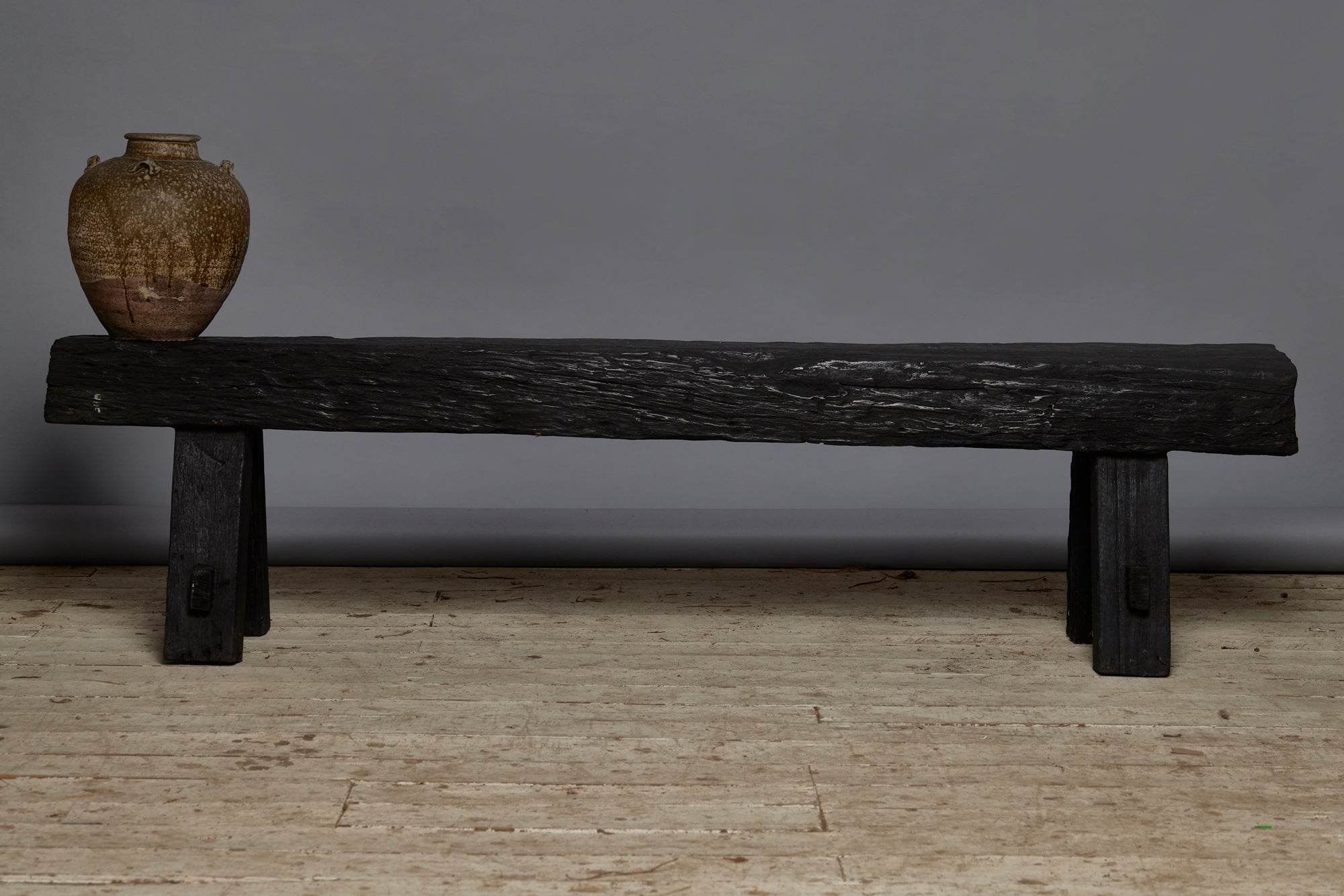 Long Chunky Top Ebonized Teak bench constructed from Bridge parts from Borneo