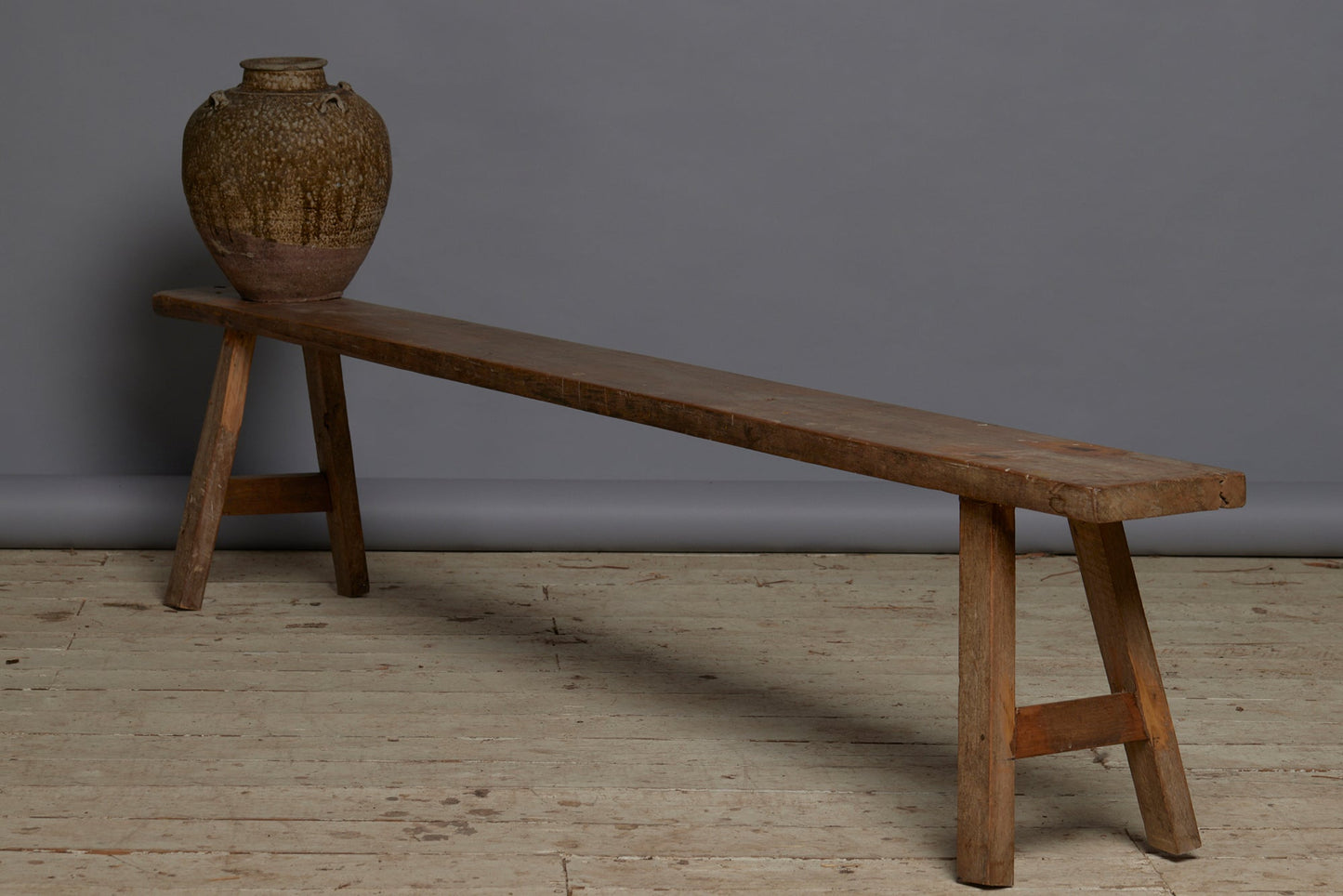 Long Skinnny Dutch Colonial Teak Bench with a Stretcher Base from Java