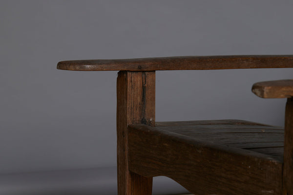Slat Back and Seated 19th Century Teak Lounge Chair with a Carved Foliate Crest