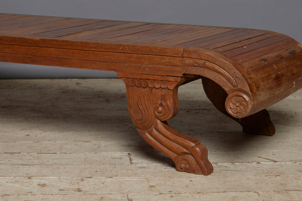 Pair of Slat Seated 19th Century Dutch Colonial Carved Teak Neo Classic Chaises with Stylized Lion Paw Feet and Rosettes