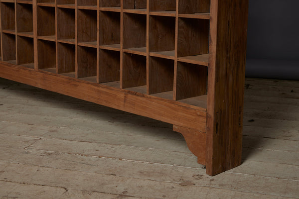 Late 19th Early 20th Century Teak Shallow Gridded Room Divider with a Delicate Skeletal Base from Jakarta