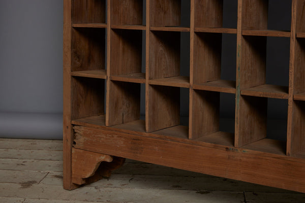 Late 19th Early 20th Century Teak Shallow Gridded Room Divider with a Delicate Skeletal Base from Jakarta