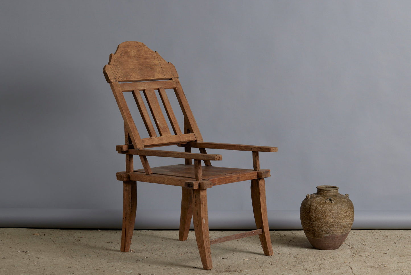 Dutch Colonial Crested Top Teak Lounging Chair from Sumatra