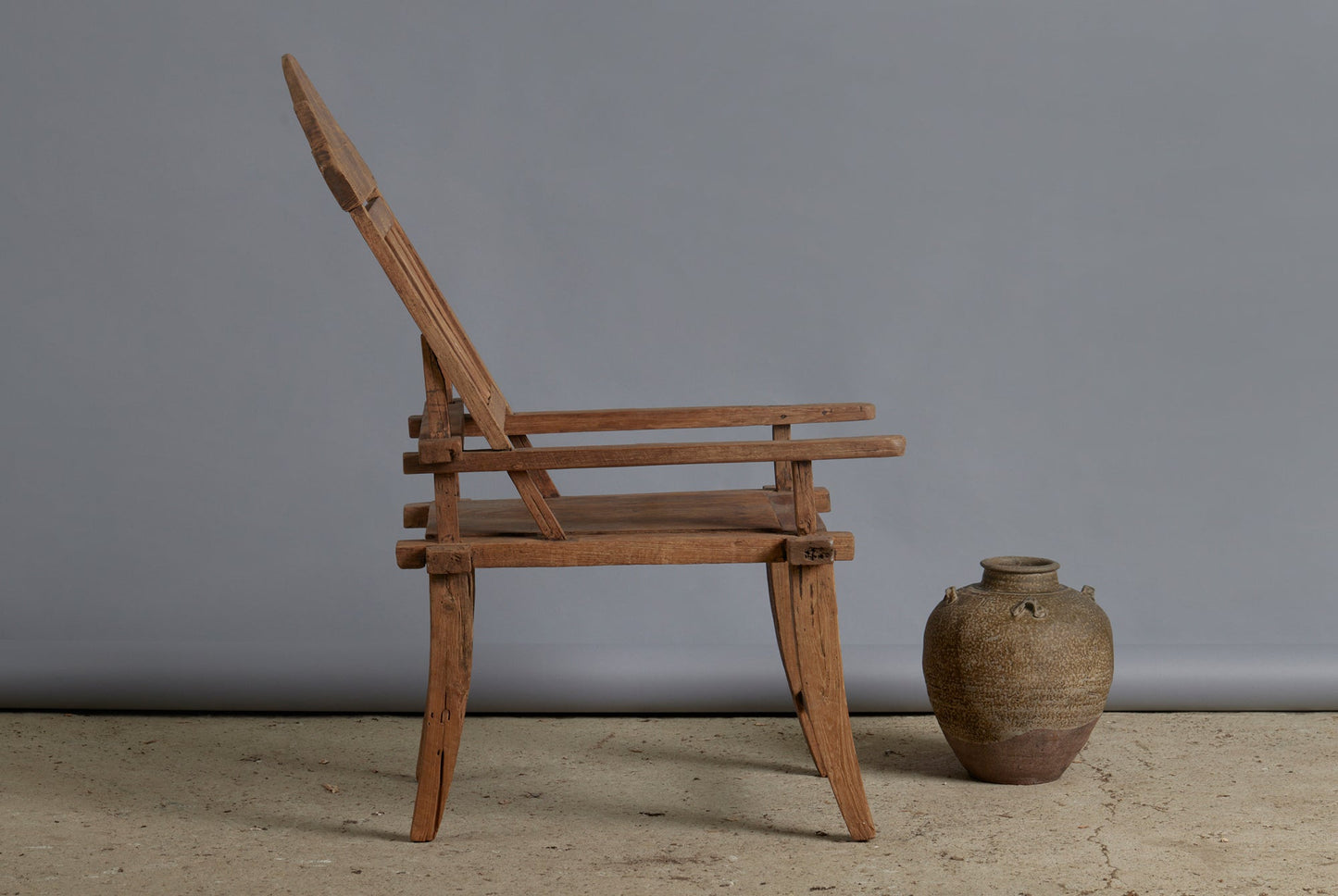 Dutch Colonial Crested Top Teak Lounging Chair from Sumatra