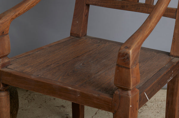 Pair of 19th Century Dutch Colonial Teak Arm Chairs with a Slightly Crested Back