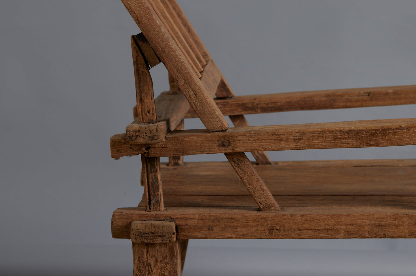 Late 19th Century Crested Back Sculptural Form Teak Lounging Chair from the Madura Island in Sumatra