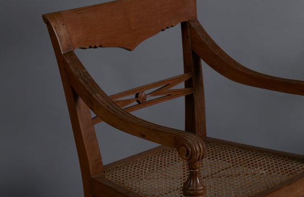 Pair of Light colored Teak Cane Seated Raffles Chairs from Java with a Delicate Gadrooned Legs
