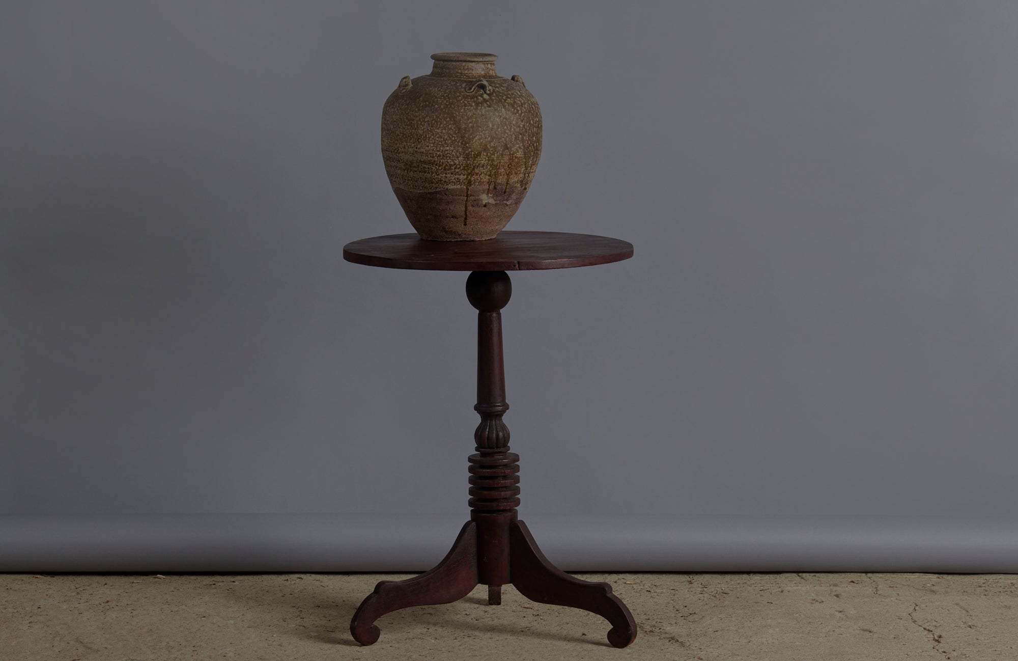Small Round Teak Side Table with Scrolled Legs and a Turned Base