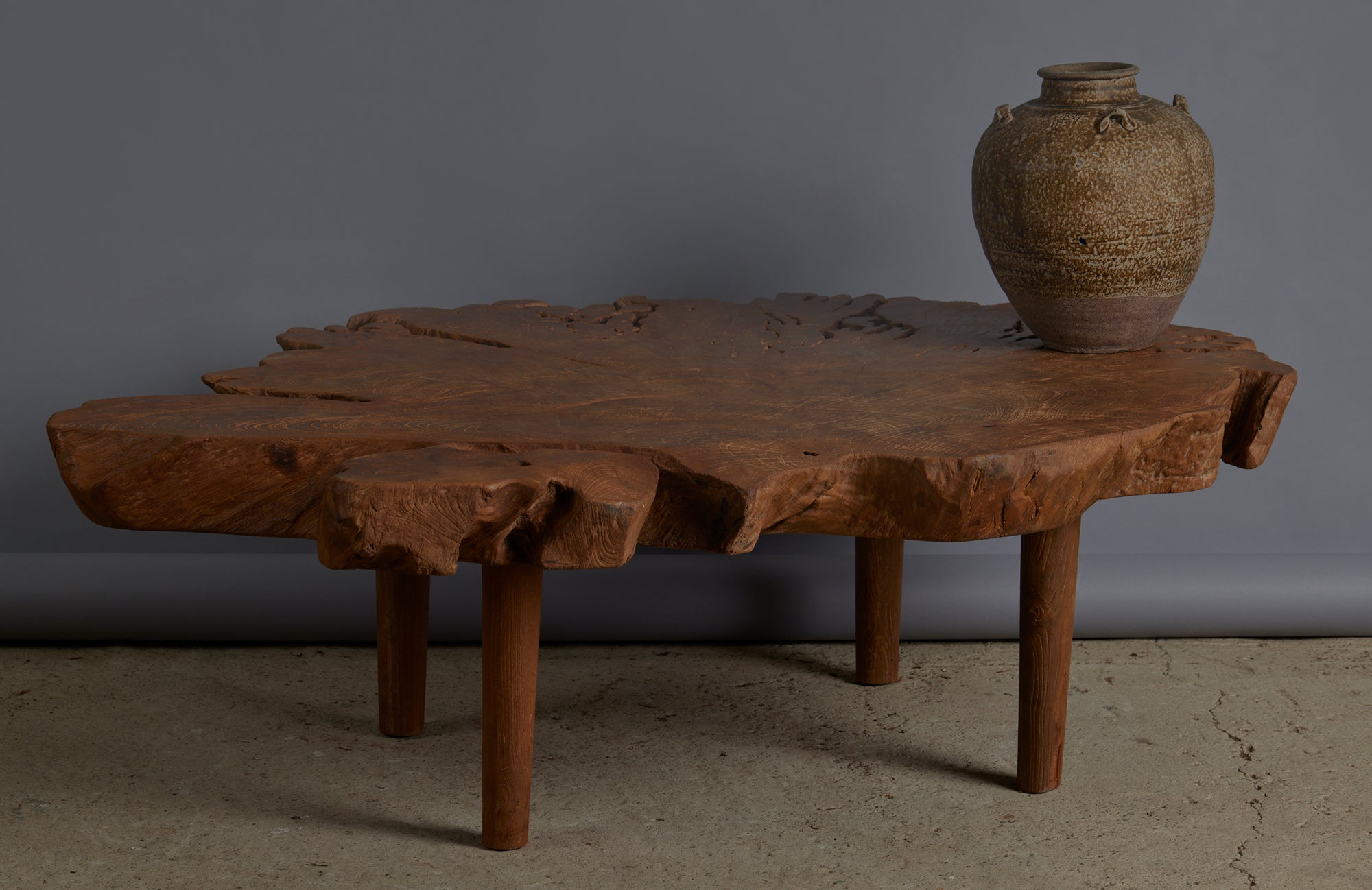 Coffee Table Made Out of an Ancient Slab of Old Growth Teak Mounted on Simple Legs