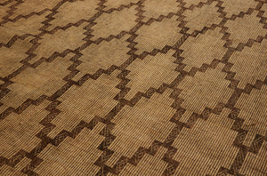 Early Medium Tuareg Carpet with Interlocking Step Diamonds with a Decorative Leather Fringe (7'5" x 12'8")
