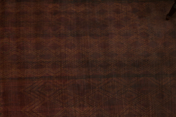 Dark Coco Colored Early Tuareg Mat with an Elaborate Overall Brocade Leather Pattern...... (5' x 6'1")