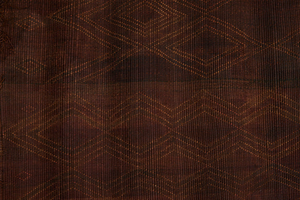 Dark Coco Colored Early Tuareg Mat with an Elaborate Overall Brocade Leather Pattern...... (5' x 6'1")