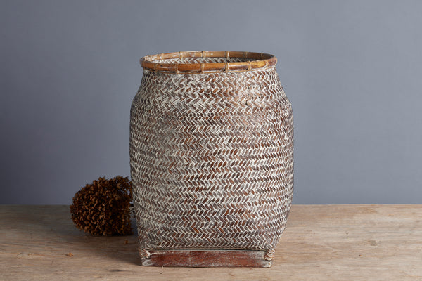 Woven Palm Gathering Basket with a Wooden Base and an Old White Wash from Borneo