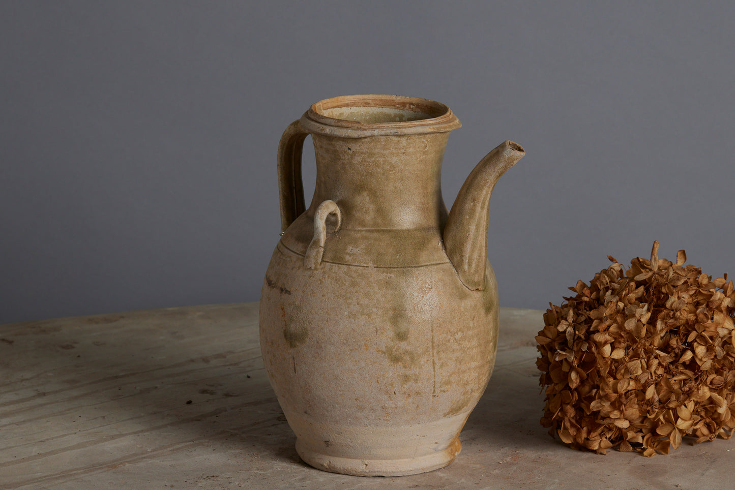 A Yue Wei Dynasty Teapot found in the Musi River Basin in Sumatra with a Pale Celadon Glaze and No Repair
