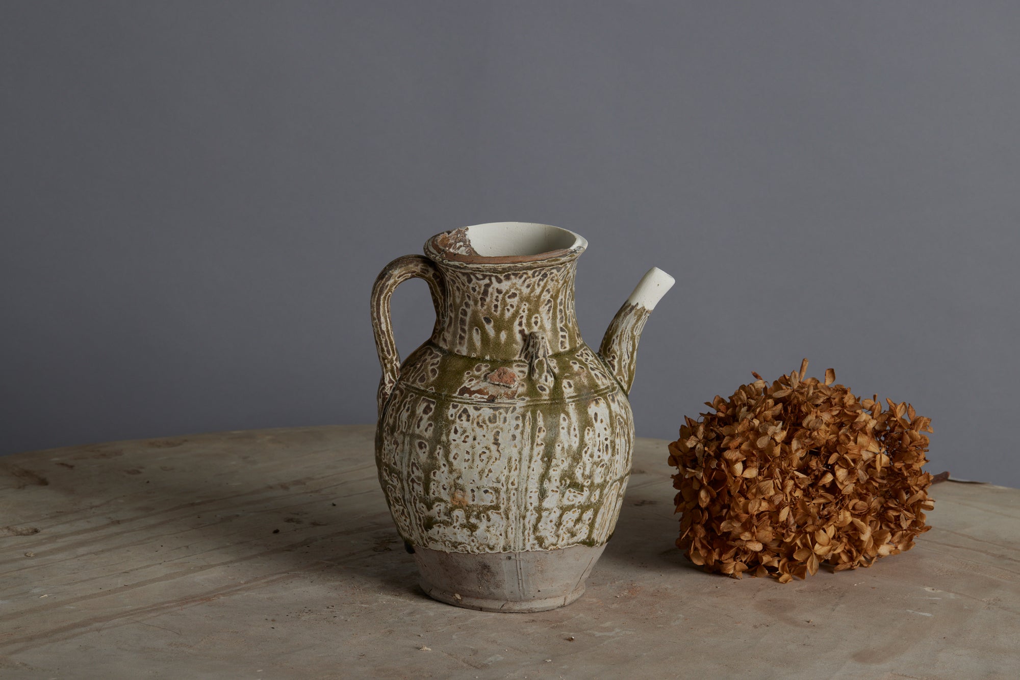 A Great Example of a Yue Wei Spatterware Teapot found in the Musi River with a Repair to the Upper Rim and the Spout