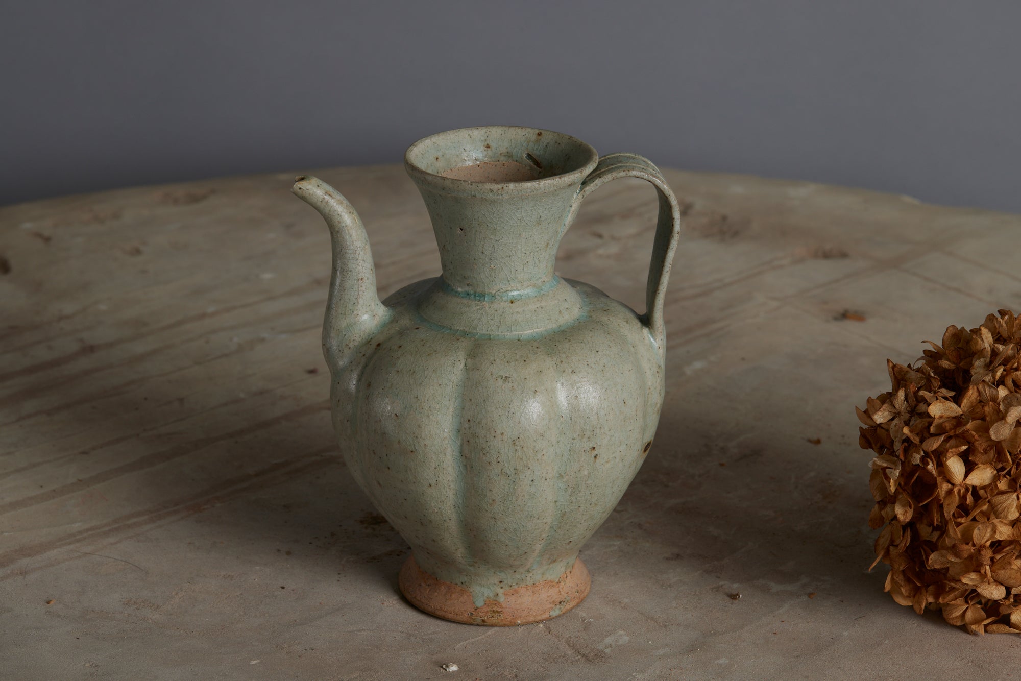 A Pale Blue Glaze Melon Body Tang Dynasty Teapot Discovered in the Musi River Basin in Remarkable Condition